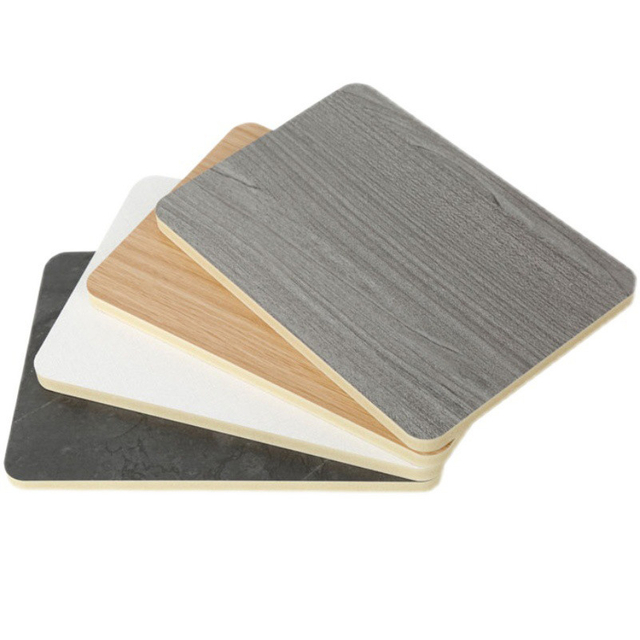 New Arrive High Density 4X8 Bamboo Charcoal Wood Veneer PVC Pet Film Laser Pattern